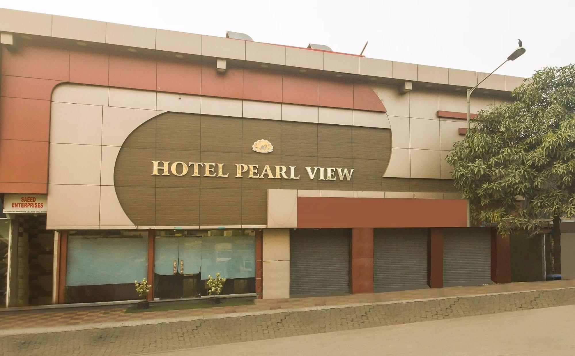 Capital O Hotel Pearl Near Us Embassy ムンバイ エクステリア 写真